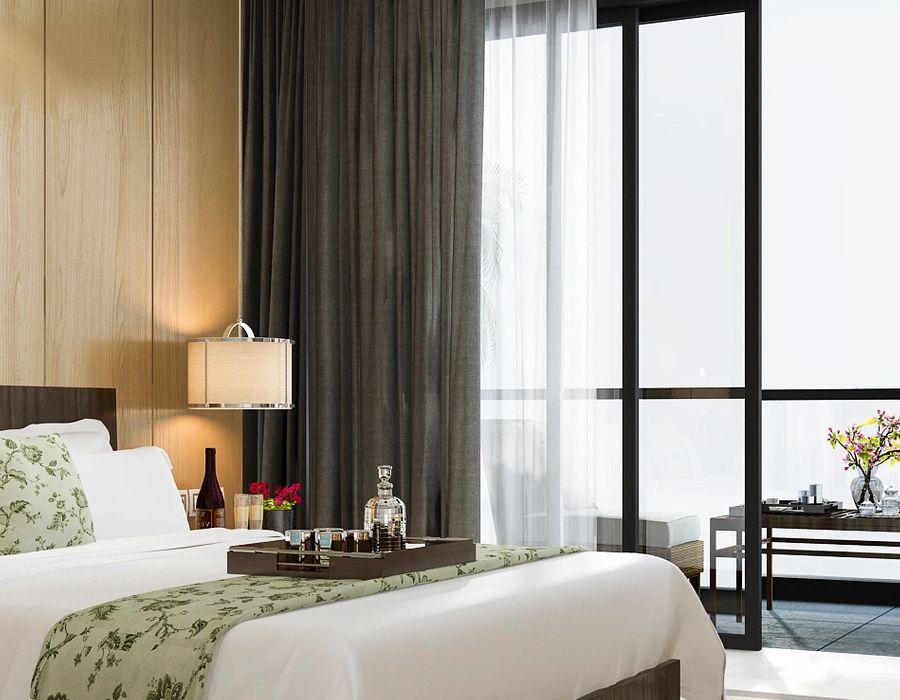 Luxury primary bedroom suite with resort-style finishes